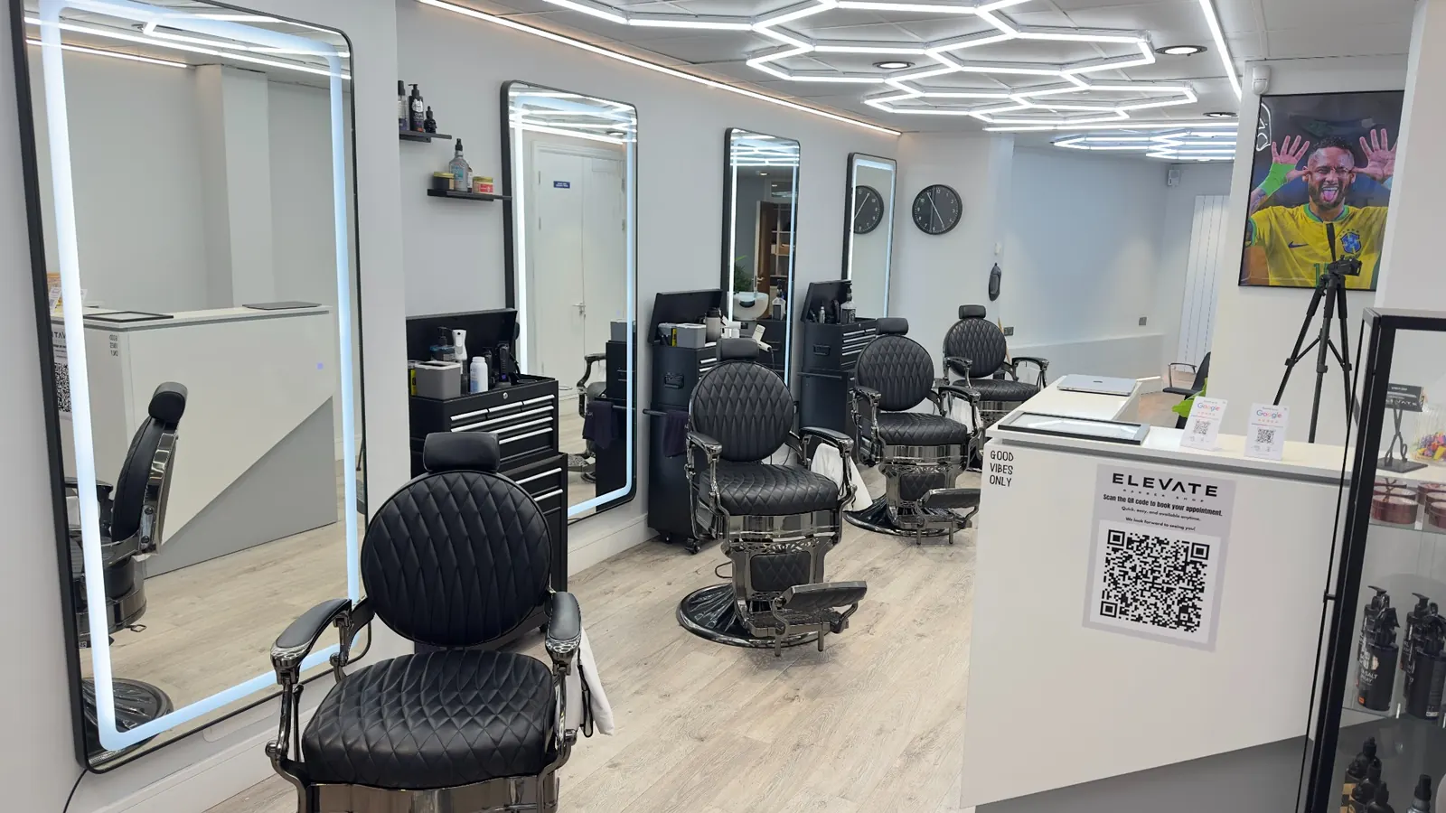 Elevate Barbershop barber chairs and mirrors